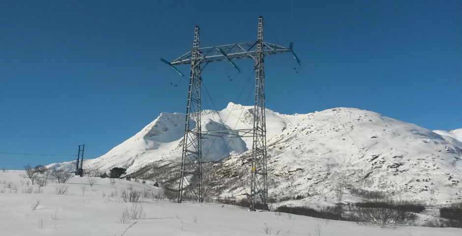 Pylon in snowy landscape